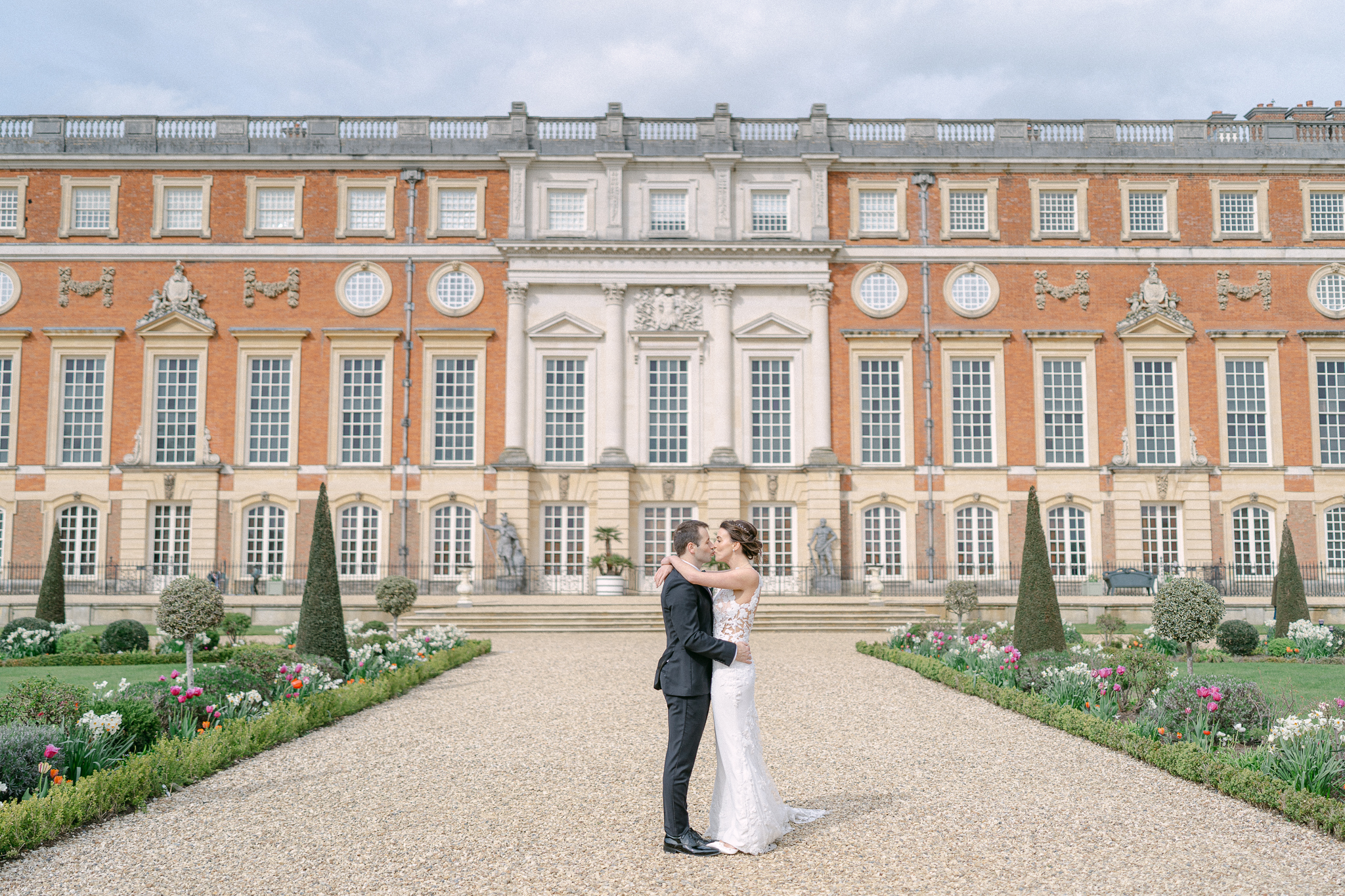 bride and groom at hampton court palace